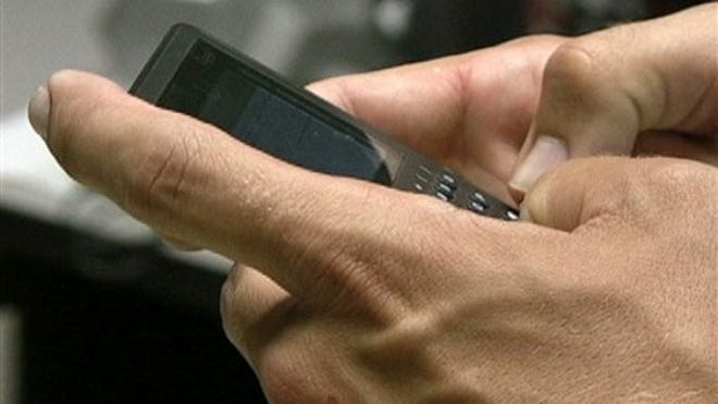 hand texting on phone